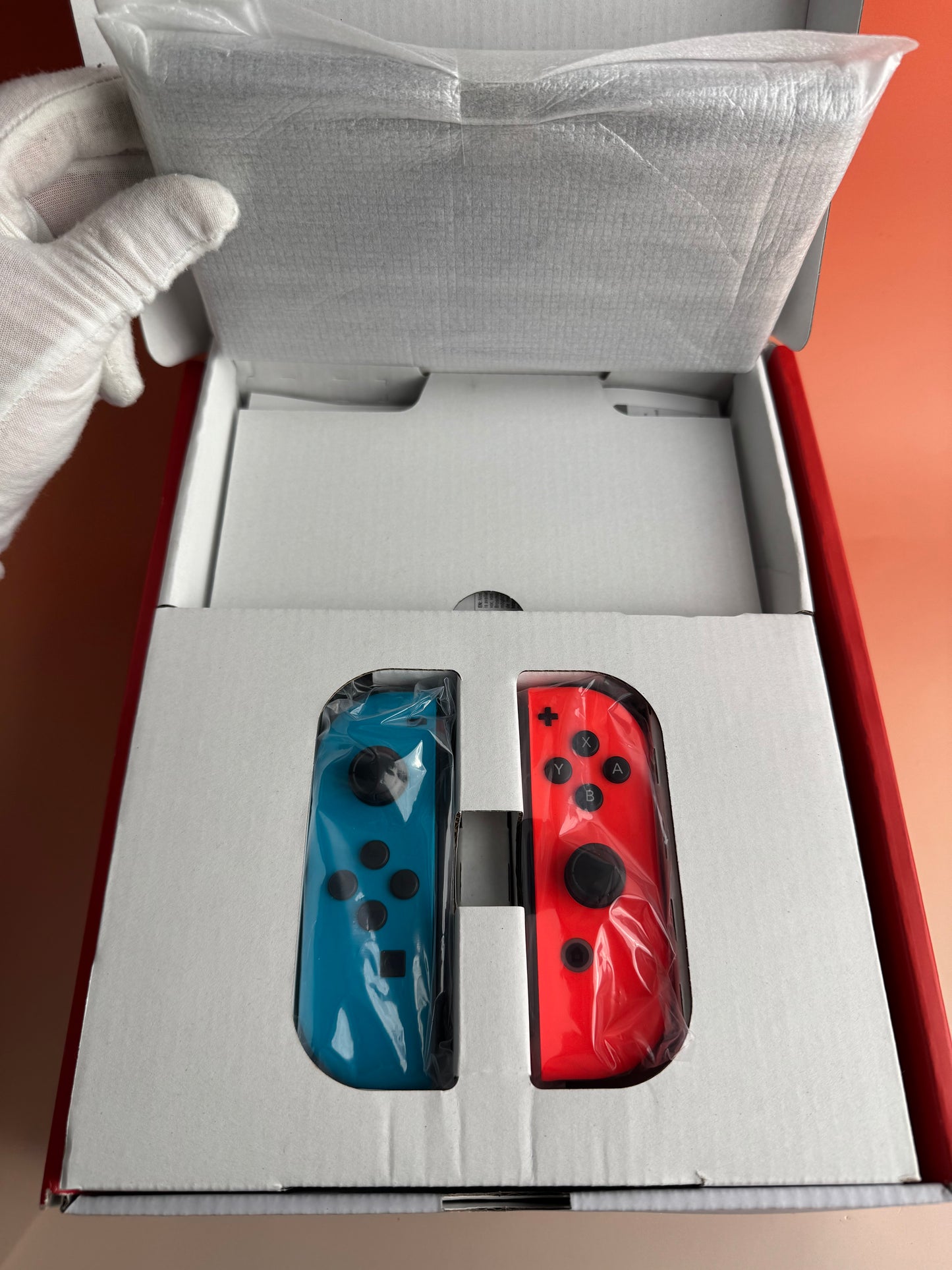 Nintendo Switch OLED | Rot / Blau | CiB OVP | Zustand A+